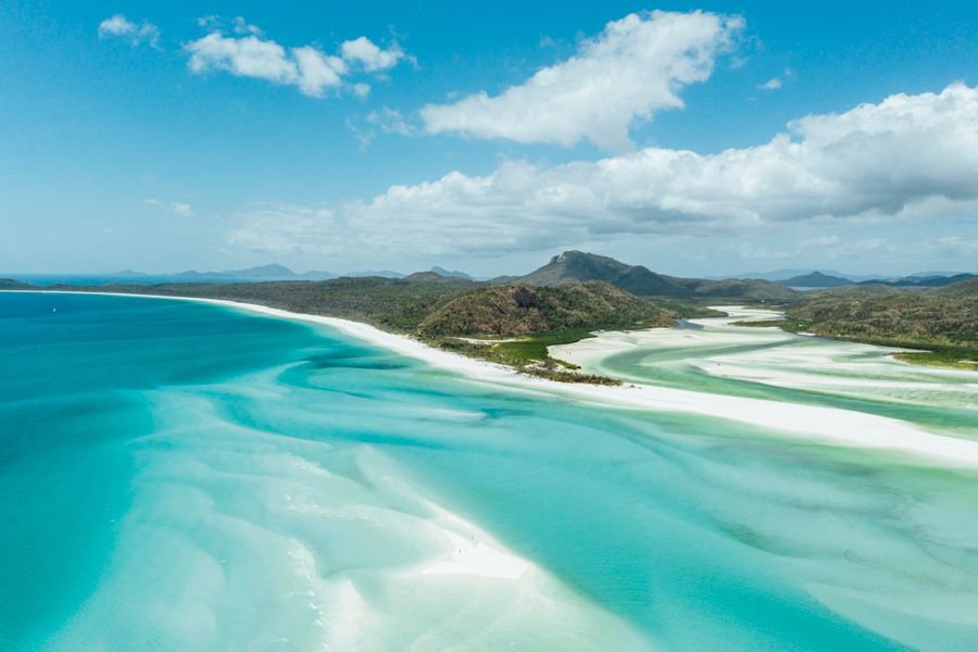 Aerial view of Whitehaven Beach and the swirling turquoise waters of Hill Inlet in the Whitsundays, Queensland